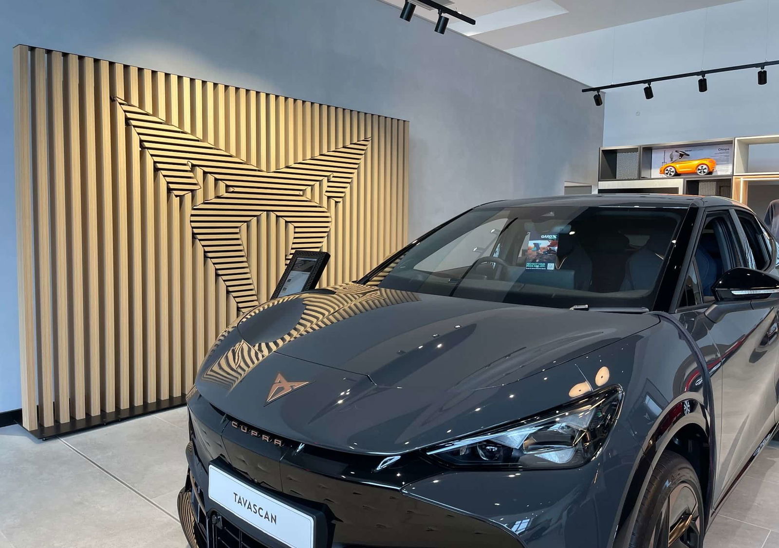 cupra oldham interior with front exterior of cupra tavascan