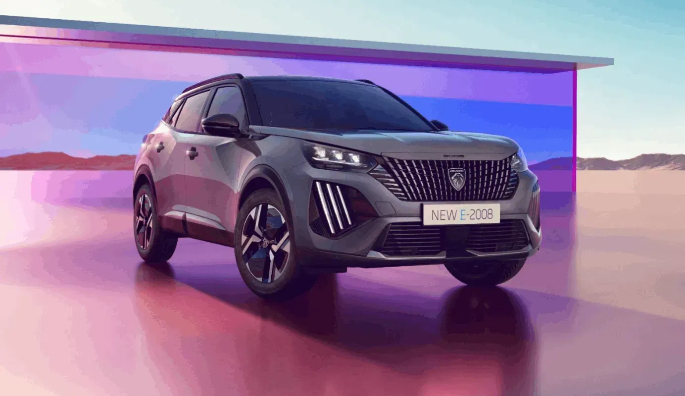 Grey PEUGEOT 2008 on display with colourful background