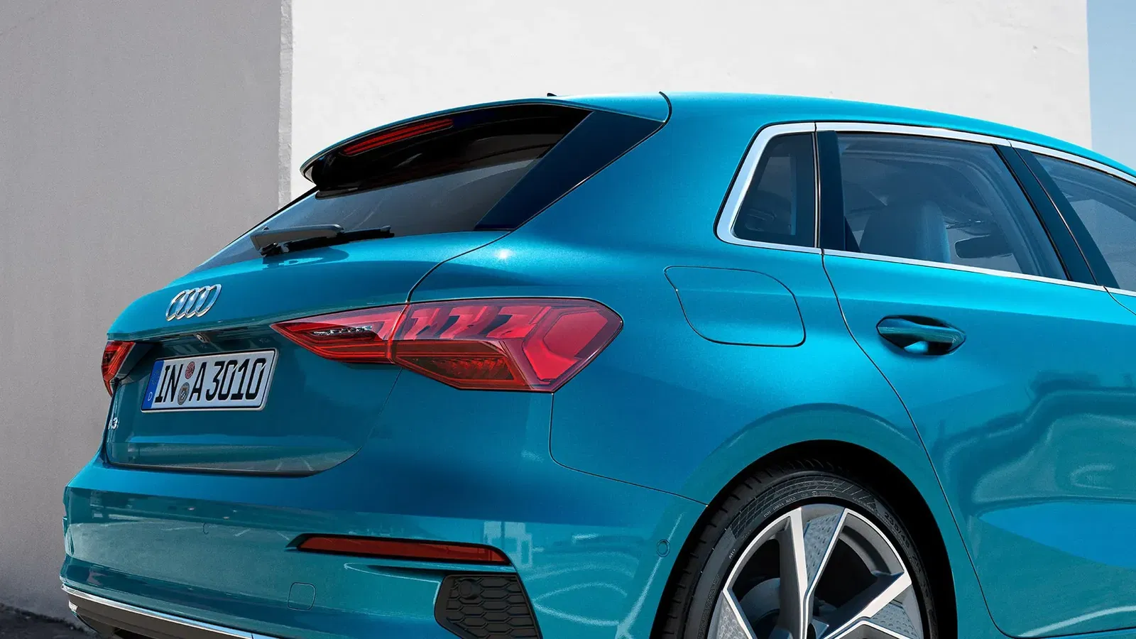 Blue Audi A3 rear side