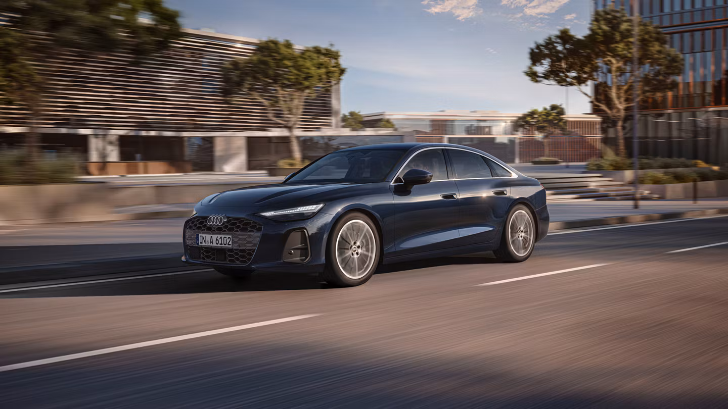 audi a6 saloon driving on road