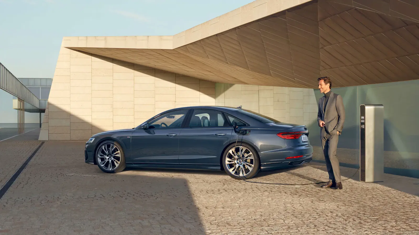 Audi A8 TFSI e parked and charging