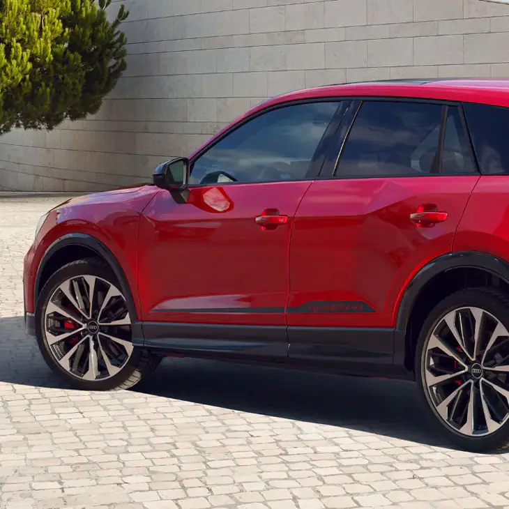 close up of  a red Audi sq2 front wheel