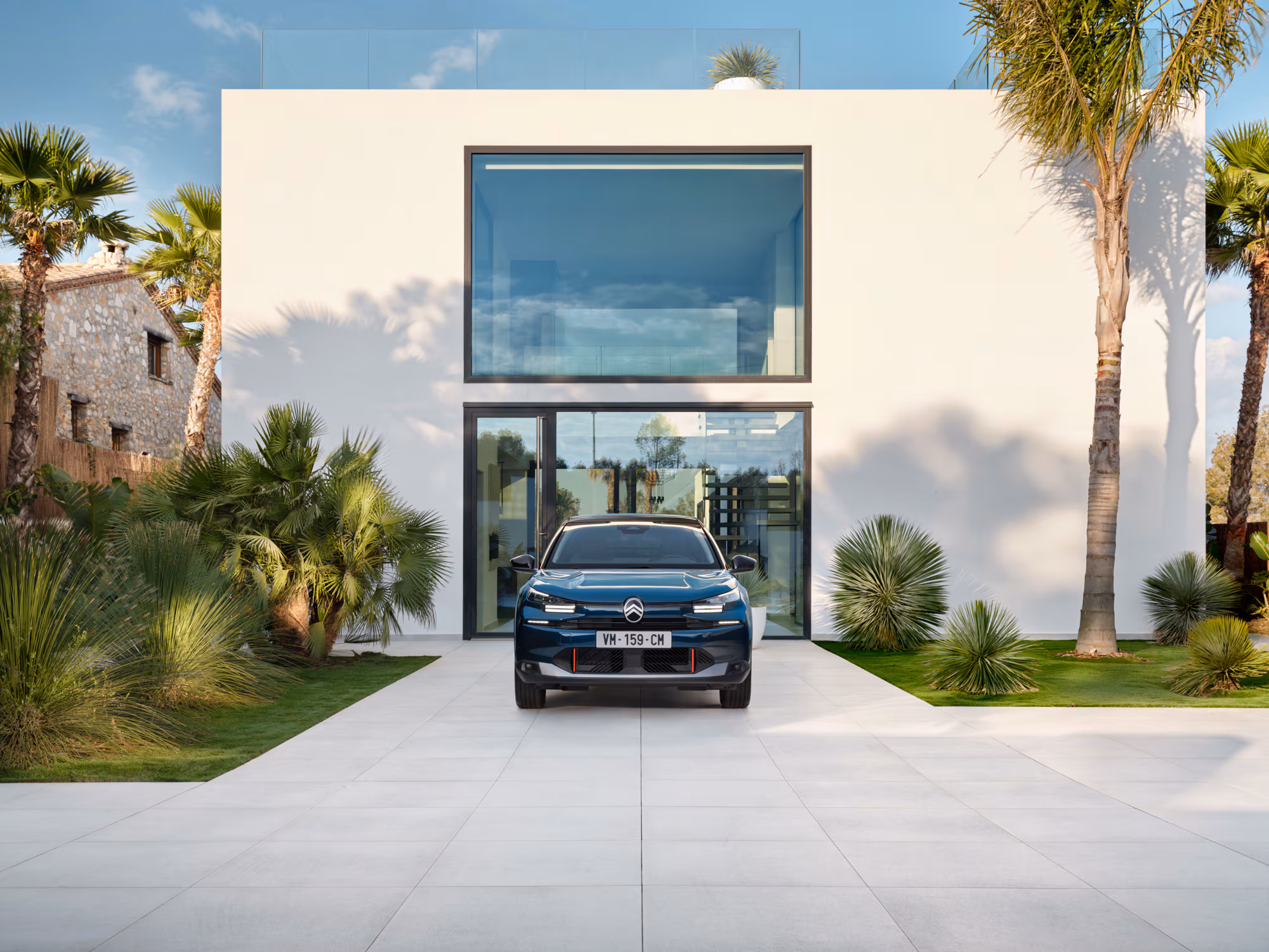 Citroen C4 Parked Up in Front of Modern Building