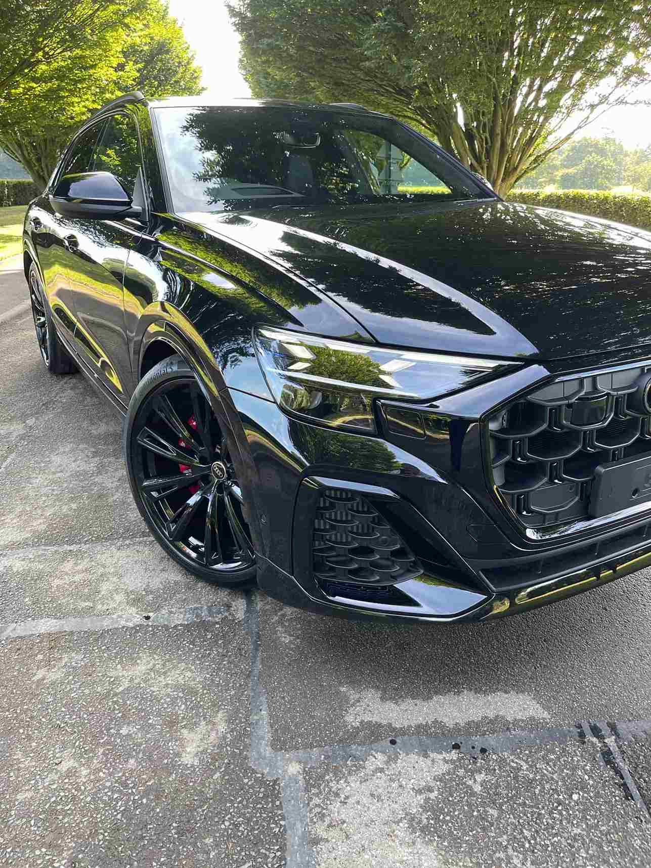 Black Audi SQ8 Headlight and Alloy Close Up