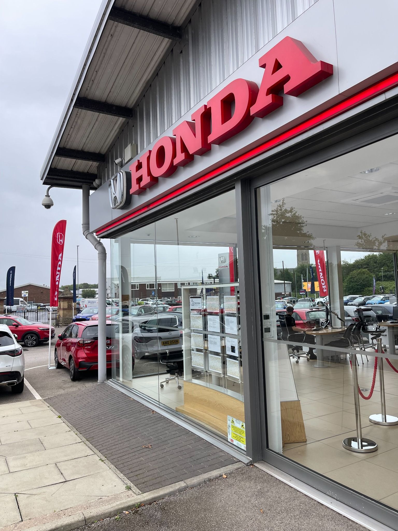 Etxerior of Honda Bolton showing main entrance to dealership