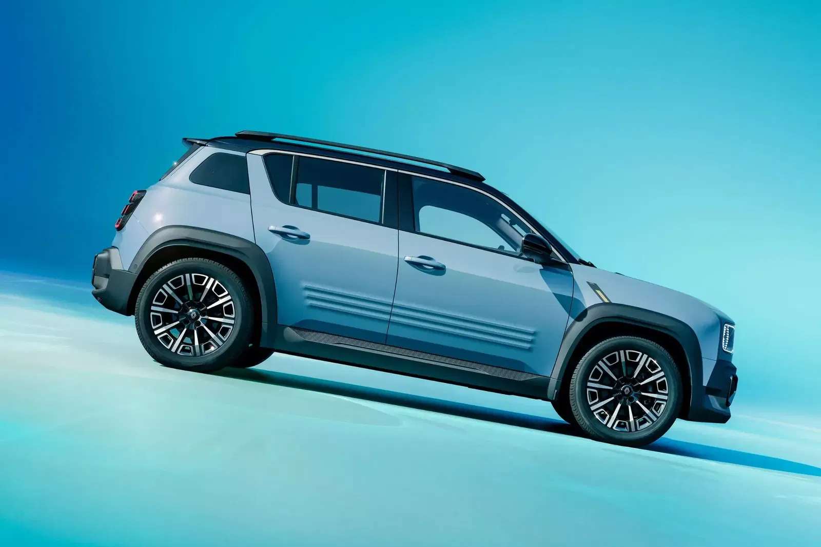 Side of Renault 4 E-Tech Parked Up