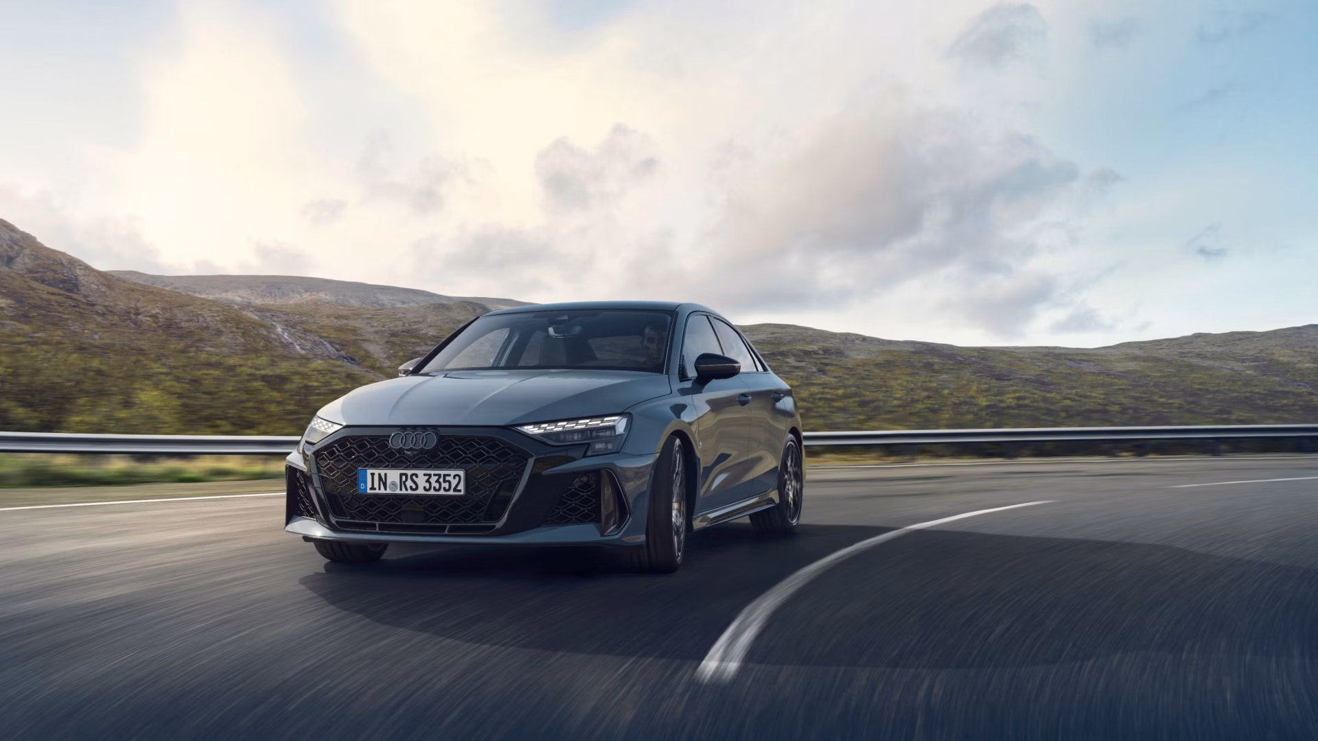Image of Grey Audi Driving throught the Countryside